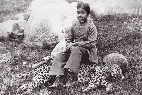 The daughter of an Indian maharajah seated on a panther she shot, sometime during 1920s. 