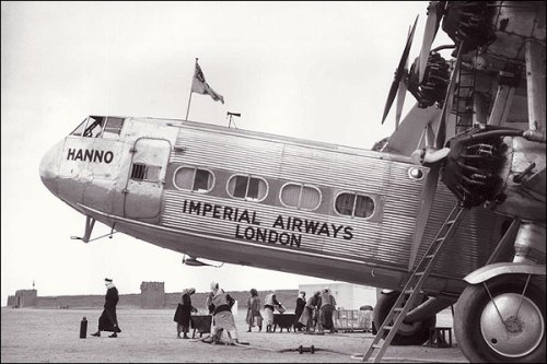 The Imperial Airways 'Hanno' Hadley Page passenger airplane carries the England to India air mail, stopping in Sharjah to refuel. 
